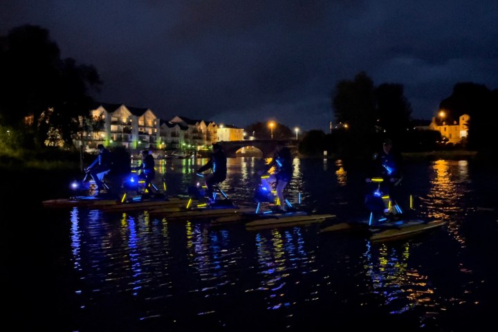 a boat that is lit up at night