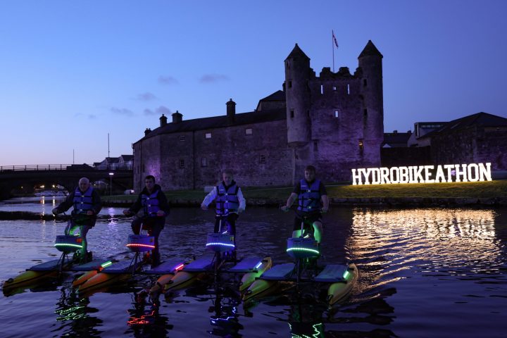 a group of people riding on the back of a castle