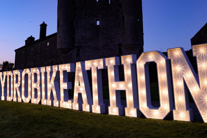 a castle on top of a bench in front of a building